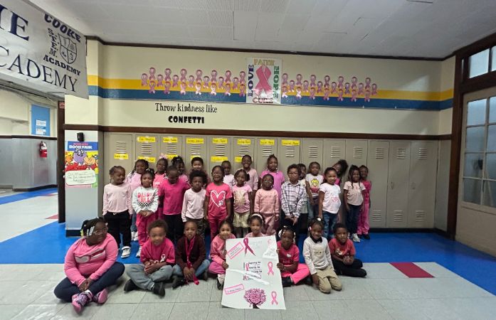  students wearing pink clothes for breast cancer awareness month in October
